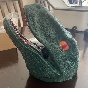 3D printed velociraptor with detail and custom painted.  Can be wall mounted.